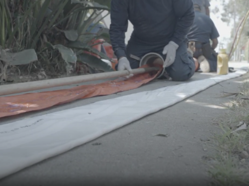 A technician is preparing a pipe for epoxy liner.