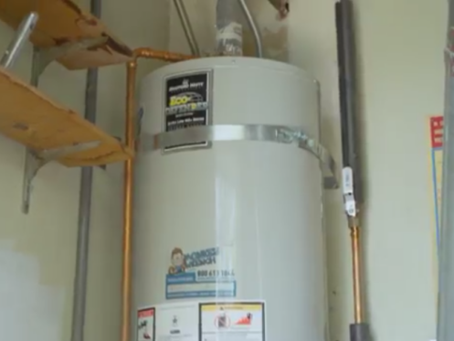 A Monkey Wrench installed conventional water heater.