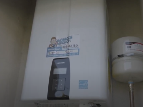 A Navien tankless water heater install with a Monkey Wrench sticker from Rick.